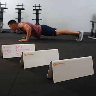 White Stroops agility hurdles made from durable whiteboard-like material, designed for speed and agility drills, workout space marking, and circuit training.