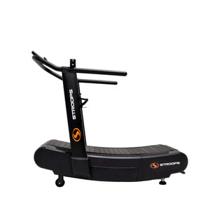 The Stroops OPTICURV is a commercial-grade curved motorless treadmill with a black steel frame and a curved, slat-style running surface. The treadmill features front support handles, a digital performance monitor, integrated transport wheels, and a self-powered design that allows users to control speed naturally without electricity, making it suitable for indoor running, sprint training, walking, and rehabilitation.