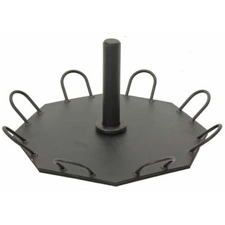 The Stroops SRPBASE Portable Base is a low-profile black octagonal steel ground anchor with eight evenly positioned connection points around its perimeter and a central area for adding weight plates. Its compact design is intended for portable group resistance training and floor-based exercises.