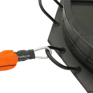 The Stroops SRPBASE Portable Base is a low-profile black octagonal steel ground anchor with eight evenly positioned connection points around its perimeter and a central area for adding weight plates. Its compact design is intended for portable group resistance training and floor-based exercises.