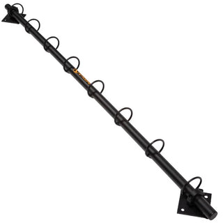 The Stroops Spine is a slim wall-mounted steel resistance band anchor with multiple horizontal anchor rings arranged vertically from high to low. The system is available in three configurations: a 78-inch version with 13 anchor points, a 48-inch version with 8 anchor points, and a slimmer 48-inch Mini with 8 anchor points.