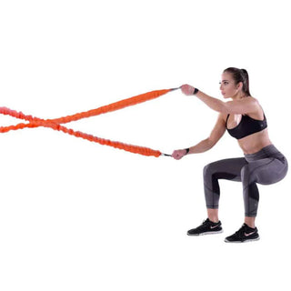 A Stroops The Beast 20-foot sleeved elastic battle rope with handles on both ends, shown as a flexible orange or black rope designed for battle rope exercises and resistance training.