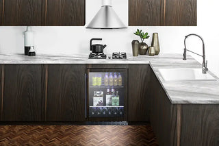 Modern kitchen with dark wood cabinets, white countertops, and a Summit ALBV2466PNR 24" Wide Built-In Beverage Cooler.