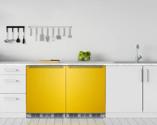 Modern kitchen with a yellow Summit BAR631BKY 24" Wide All-Refrigerator and white cabinets.