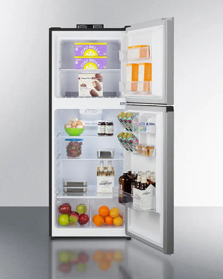 Open Summit BKRF1089PL 24" Wide Break Room Refrigerator-Freezer with food items inside on a white background