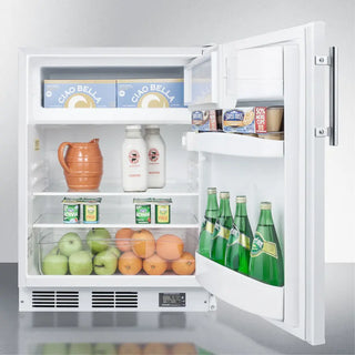 Open Summit BKRF661BIADA 24" Wide Break Room Refrigerator-Freezer with food items inside, including bottles, fruits, and containers.