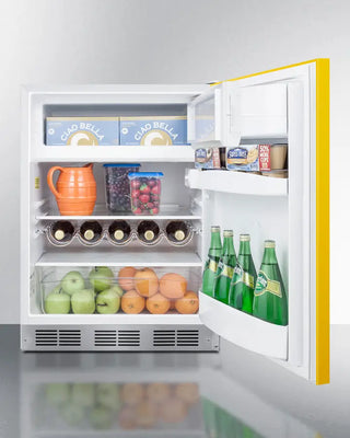 Open Summit BRF611WHYADA 24" Wide Refrigerator-Freezer with food items including bottles, fruits, and vegetables on a white background