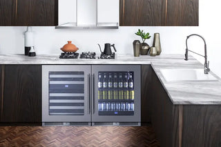 Modern kitchen with Summit CL24BV1 24" Wide Built-In Beverage Center, stovetop, and sink.