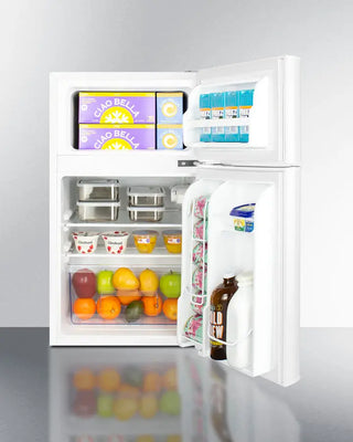 White Summit CP34WADA 19" Wide 2-Door Refrigerator-Freezer with open doors displaying food items on a gray background