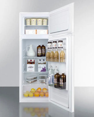 Open Summit CP962 22" Wide Refrigerator-Freezer with various items inside on a light gray background
