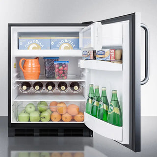 Open Summit CT663BKCSS 24" Wide Built-In Refrigerator-Freezer with food items including bottles, fruits, and vegetables.
