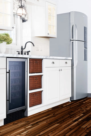 Summit SWC1840B built in under a white kitchen counter next to a sink