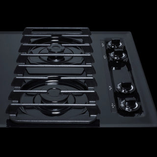 Summit TTL053S cooktop close-up of burner grates beside the control knobs