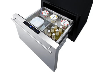 Summit SDR241OS stainless steel refrigerator drawer shown open from an overhead angle, featuring a digital touch control panel, removable divider system, beverage bottles, yogurt cups, and food storage containers organized inside the cooling compartment.