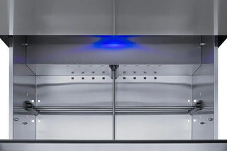 Close-up interior view of the Summit SPR3032DADA refrigerator showing the stainless steel liner, blue LED lighting, and storage support rails.