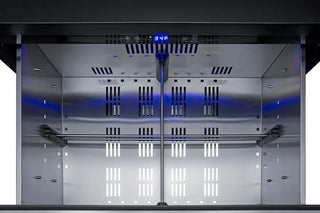 Interior view of the Summit SPR3032DPNRADA outdoor refrigerator featuring a stainless steel cabinet, digital temperature display, ventilation system, and blue LED lighting.