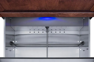 Interior view of the Summit SPR3032DPNR refrigerator featuring a stainless steel cabinet, adjustable storage rails, and blue LED illumination.