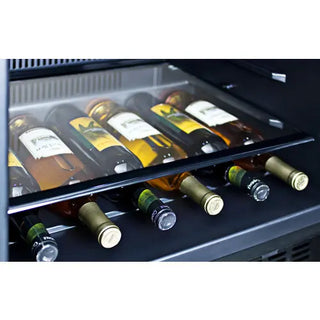 Close-up view of the Summit SPR627OSIF wine refrigerator interior showing wine bottles stored on sliding shelves.