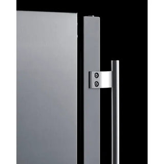 Close-up view of the Summit SPR618OSADA stainless steel outdoor refrigerator door, highlighting the integrated hinge mechanism and tubular handle design.