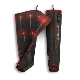 Therabody JetBoots PRO Plus compression boots with one boot opened out to show the infrared lighting inside