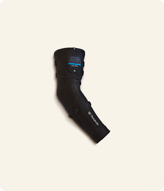 Therabody RecoveryPulse Arm sleeve shown on its own, shaped as if worn on a bent arm