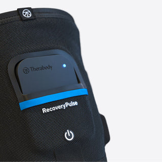 Close-up of the removable control pod on the Therabody RecoveryPulse Calf sleeve