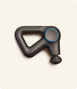 Therabody Theragun Prime Plus massage gun shown from the side on a plain background