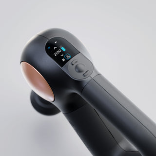 Close-up of the display and control buttons on the Therabody Theragun Sense