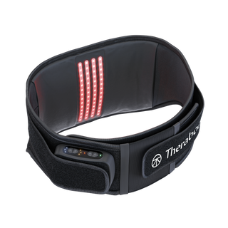 Angled view of the Therabody ThermBack LED curved into a belt shape with the control module facing forward