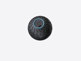 Therabody WaveSolo massage ball shown on its own with the control ring lit
