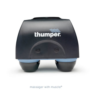 Thumper Mini Pro professional handheld percussion massager in dark gray and blue with an ergonomic long handle.