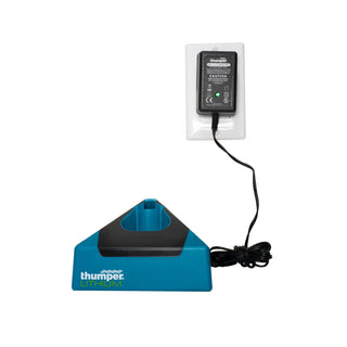 Thumper Lithium8 cordless professional percussion massager in black and teal with dual handles and eight massage heads.