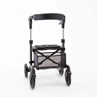 Compact Triumph Mobility Escape Petite rollator with a lightweight aluminum frame, padded seat, adjustable padded backrest, anatomical handgrips, four wheels, and a folding shopping bag beneath the seat.