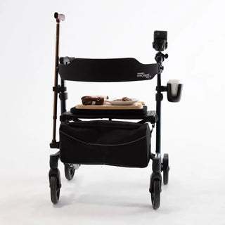 Triumph Mobility Escape HD heavy-duty rollator with an aluminum frame, extra-wide padded seat, adjustable padded backrest, four large wheels, ergonomic handgrips, and a large fabric shopping bag beneath the seat.