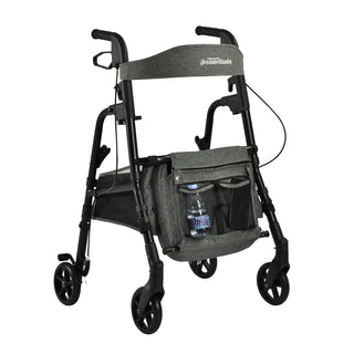 Black Triumph Essentials folding rollator with a padded seat, shopping basket beneath the seat, backrest, adjustable handles, front 6-inch swivel wheels, cane holder, and cup holder.