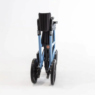 Triumph Prestige all-in-one rollator and transport chair with a black padded seat, padded backrest, ergonomic handgrips, armrests, four wheels, and integrated footrests in transport chair configuration.