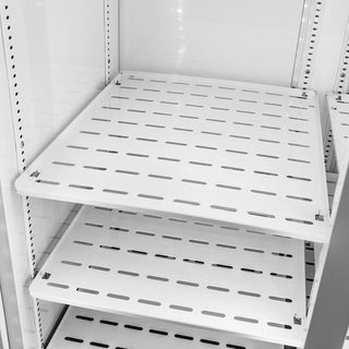 Close-up view of the adjustable perforated interior shelves inside the True Scientific TSCI-1200R-G-PH~TSL01 RX3 pharmacy and vaccine refrigerator.