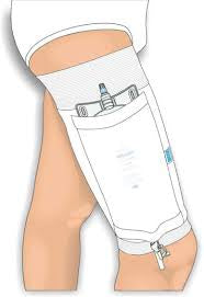 White Urocare® 971560_CS Upper Leg Strap  X-Large, Cotton-Foam on a person's leg with medical equipment attached.
