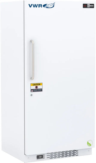 A white VWR upright freezer with a silver handle, featuring a yellow caution label and a small green circular icon on the door, set against a plain white background.