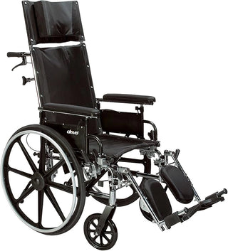 Black wheelchair with armrests and footrests on a white background