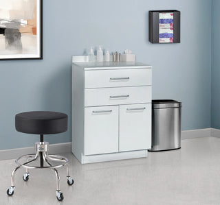 Viva Comfort ADIME902-24-GRY grey base cabinet in an exam room beside a stool and waste bin