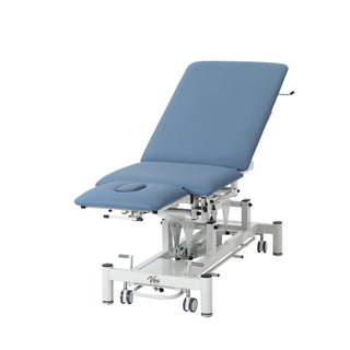 Viva Comfort ADI903-01 Elite hi-lo exam table, rear angle with backrest reclined and top lowered