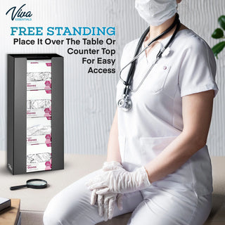 Viva Comfort ADI902-04 black glove dispenser standing on a counter beside a seated nurse