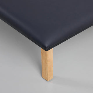 Viva Comfort ADI996-06 Regal folding therapy table close-up of black top corner and leg