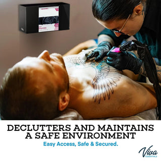 Viva Comfort ADI902-01 black glove dispenser mounted on the wall of a tattoo studio