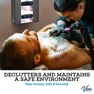 Viva Comfort ADI902-03 black glove dispenser mounted on the wall of a tattoo studio