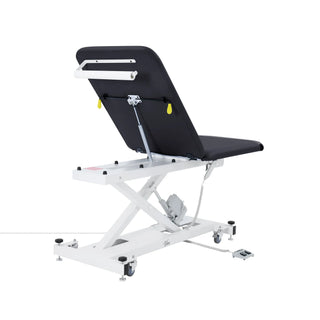 Viva Comfort ADI903-20 Xro exam table rear view showing backrest support and paper roll holder
