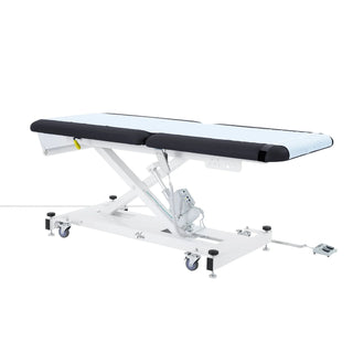 Viva Comfort ADI903-20 Xro exam table laid flat with exam paper covering the black top