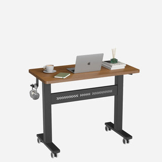 WalkingPad ETD3 standing desk raised to standing height with a laptop on top