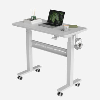White WalkingPad ETD3 standing desk set up with a laptop and headphones